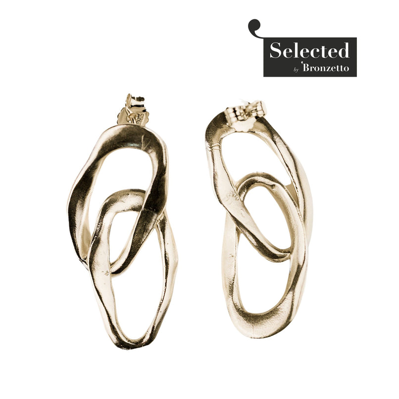 Enchanted double ovals brass earrings by Flor Rubaja