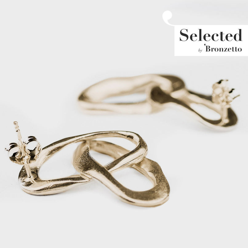 Enchanted double ovals brass earrings by Flor Rubaja