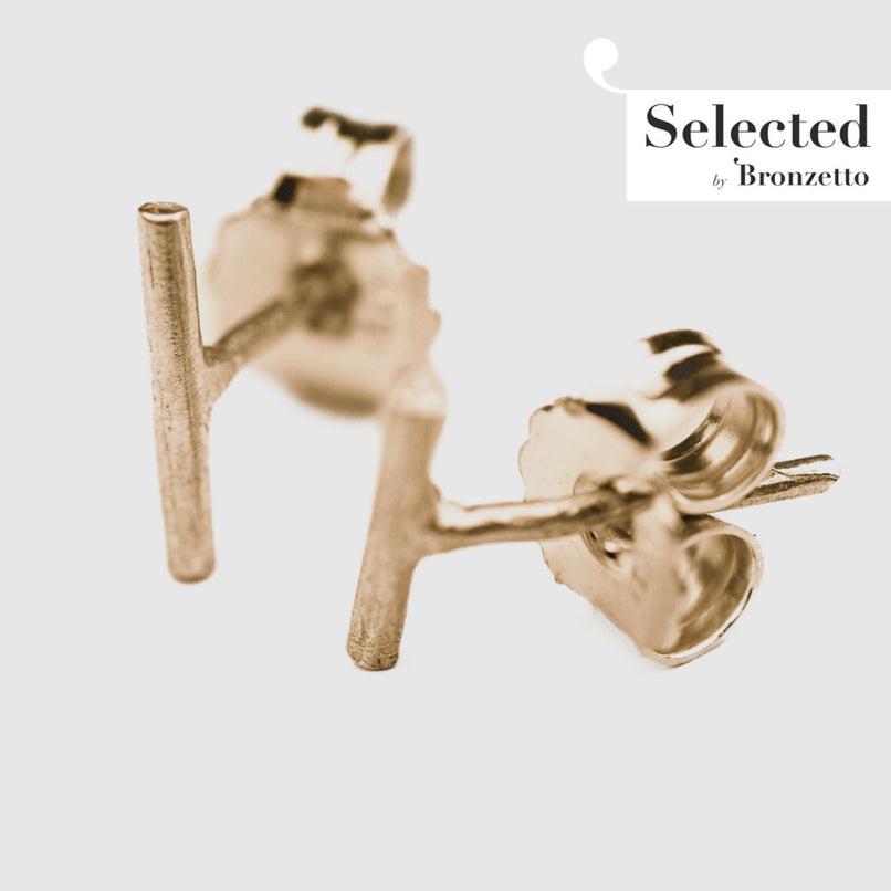 Magic wand brass earrings by Flor Rubaja