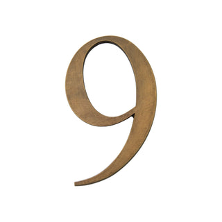 This is a small house number 9, crafted from solid brass. It has a smooth, polished surface with an elegant and timeless finish. The compact size makes it perfect for a subtle yet stylish addition to any home's exterior. Its durable material ensures long-lasting quality and resilience.