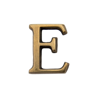 This is a small-sized letter E, made of solid brass. It features a smooth, polished surface with a sleek and elegant finish. The compact design makes it a subtle yet refined addition to any home exterior, blending perfectly with modern or traditional styles. Its durable brass material ensures long-lasting quality and timeless appeal.