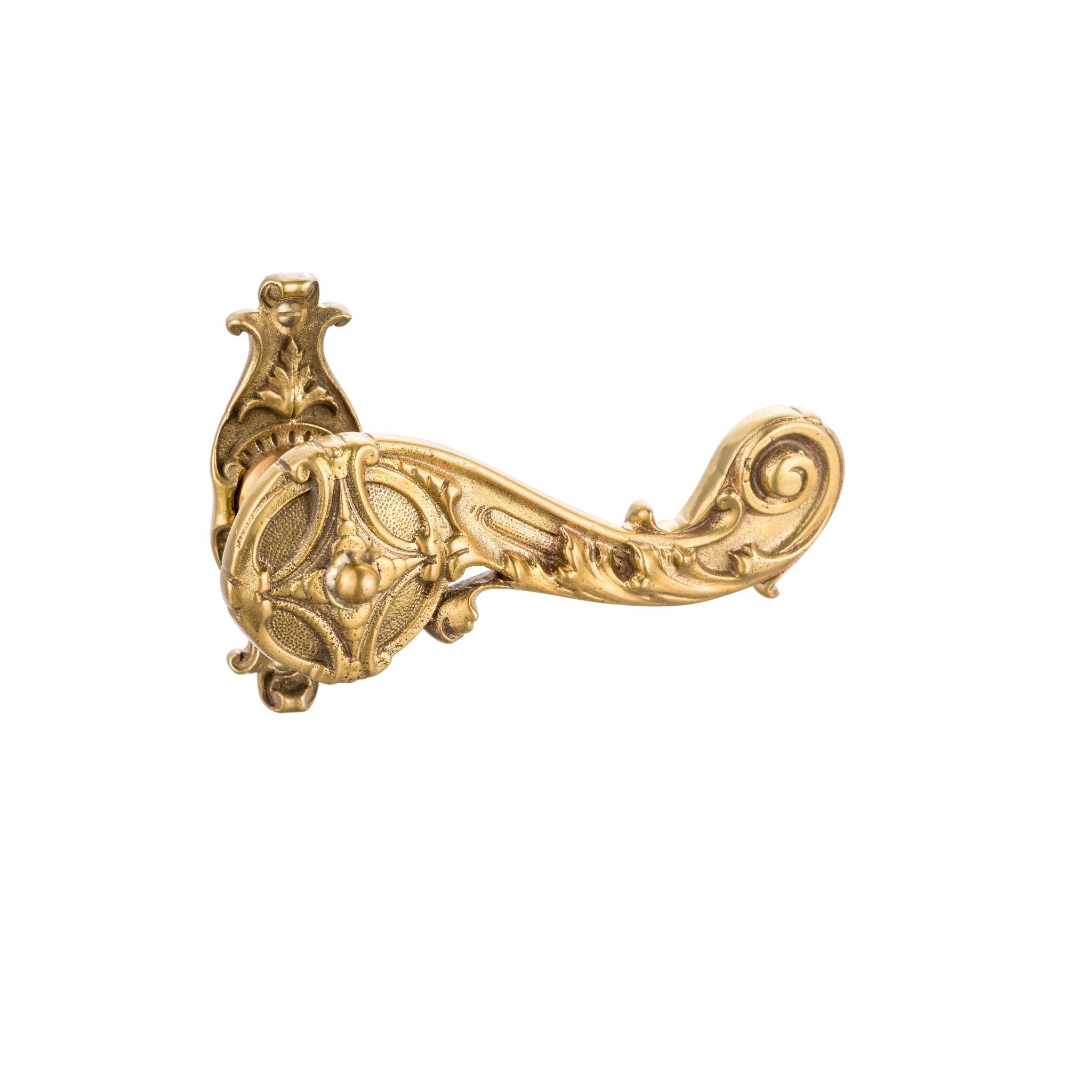 This is a brass door handle with decorative detailing, crafted to bring elegance to any door. The handle has a polished, golden-brass finish, smooth to the touch with a slight warmth. It features raised decorative accents along its length, providing a textured, intricate feel under the fingers. The shape is ergonomic, designed for a comfortable grip, combining classic style with functionality, perfect for adding a refined touch to any interior.