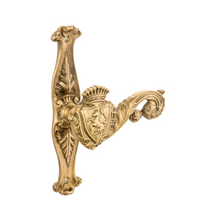 This is a brass door handle with a detailed horse motif, adding a touch of equestrian elegance. The handle has a smooth, polished brass finish, giving it a warm, golden tone and a cool feel to the touch. The horse design is raised, offering a textured, intricate pattern that can be felt with the fingers. The ergonomic shape makes it comfortable to hold and use, combining functionality with a classic, artistic accent for refined interiors.