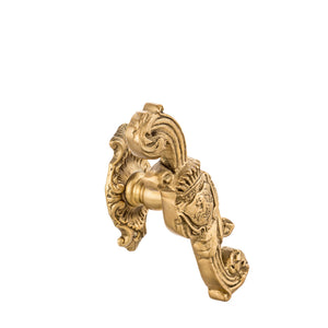 This is a brass window handle featuring an intricate horse motif, designed to add a refined equestrian touch. The handle has a polished brass finish, providing a warm, golden color and a cool, smooth feel to the touch. The raised horse design adds texture, allowing the details to be felt with the fingers. Its ergonomic shape ensures a comfortable grip, blending both functionality and elegant decor, perfect for adding a unique accent to any window.