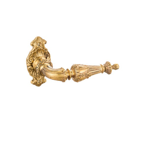 This is a brass door handle adorned with an intricate leaf motif, bringing a touch of nature-inspired elegance. The handle has a smooth, polished brass finish, warm in tone and cool to the touch. Raised leaf patterns along the handle provide a textured, detailed design that can be felt with the fingers. Its ergonomic shape offers a comfortable grip, combining functionality with a refined, organic style, perfect for adding a unique touch to any door.