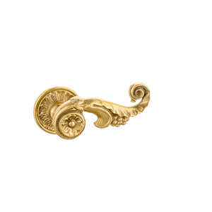 This door handle is made of solid brass and features a delicate, raised leaf pattern that adds texture and character. The handle itself is smooth and rounded, with a comfortable, sturdy grip. The leaf design is slightly elevated, allowing fingers to trace the natural contours and veins, giving a tactile experience of the organic motif. The brass has a warm, golden tone with a subtle sheen, bringing a sense of timeless elegance and natural beauty to the door.