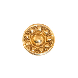 Novecento Budapest Brass Knob: A circular brass knob featuring a sun-shaped decoration, perfect for adding a touch of brilliance to your décor.