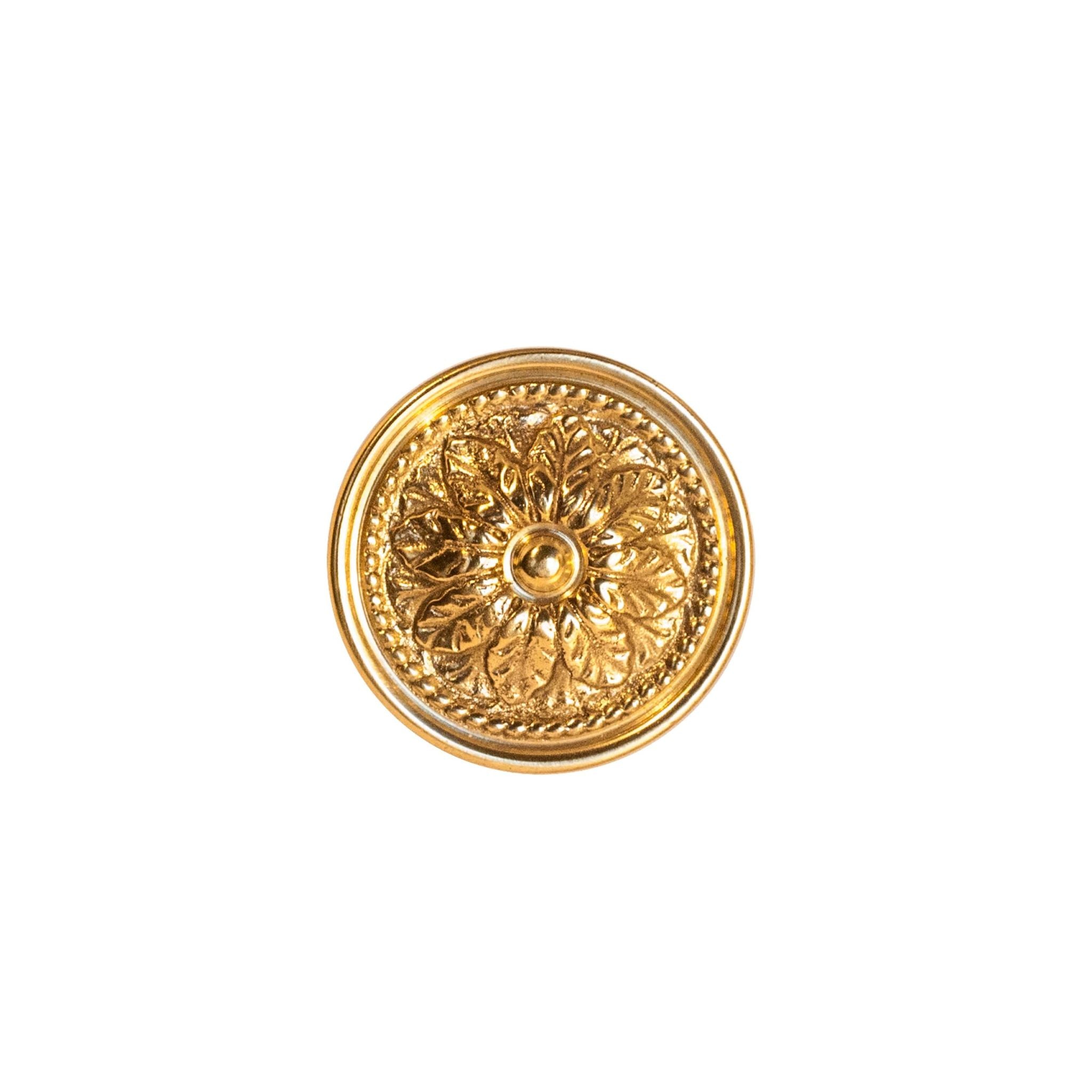 Novecento Marsiglia Brass Knob: A circular brass knob featuring a delicate floral decoration, perfect for adding elegance to your décor.