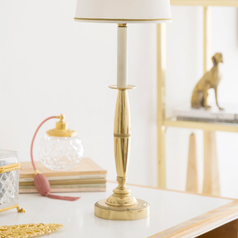 Novecento brass table lamp with round base