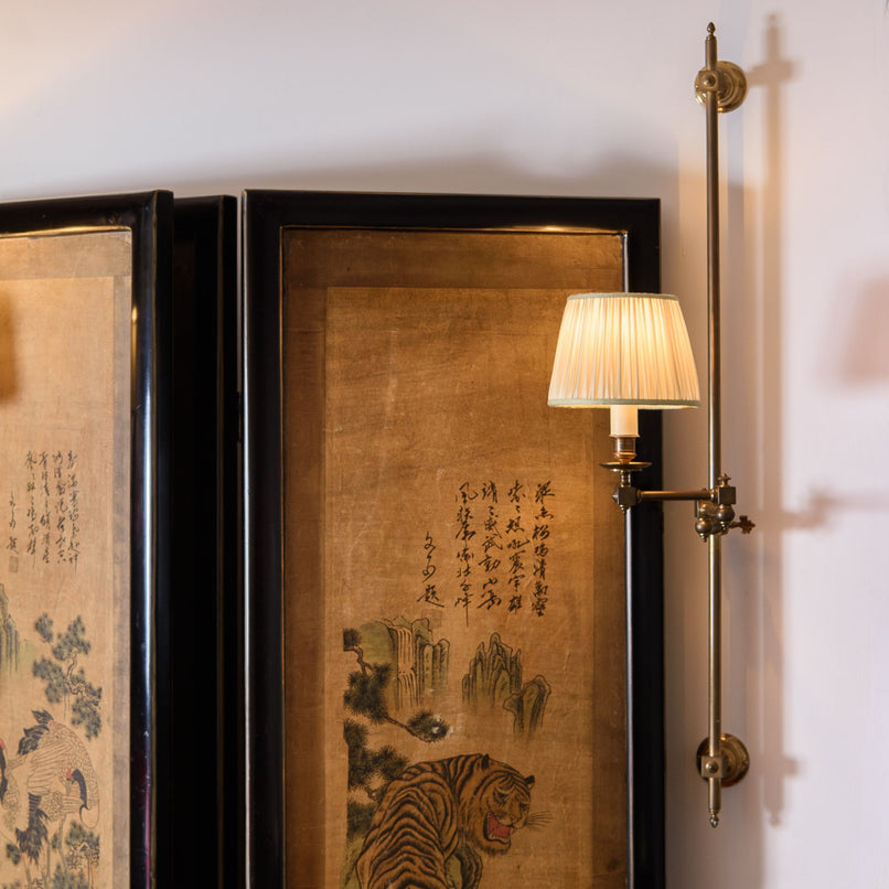 Novecento brass wall light with joints