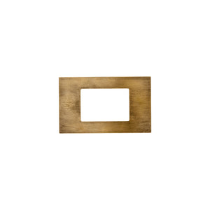 This brass switch plate features a smooth, polished surface with rounded edges for a refined, classic feel. The plate is flat and sits securely around the light switch, providing an easy-to-touch, sturdy cover. The brass material feels warm and solid, adding a touch of elegance and timeless style to any wall, complementing both modern and traditional interiors.