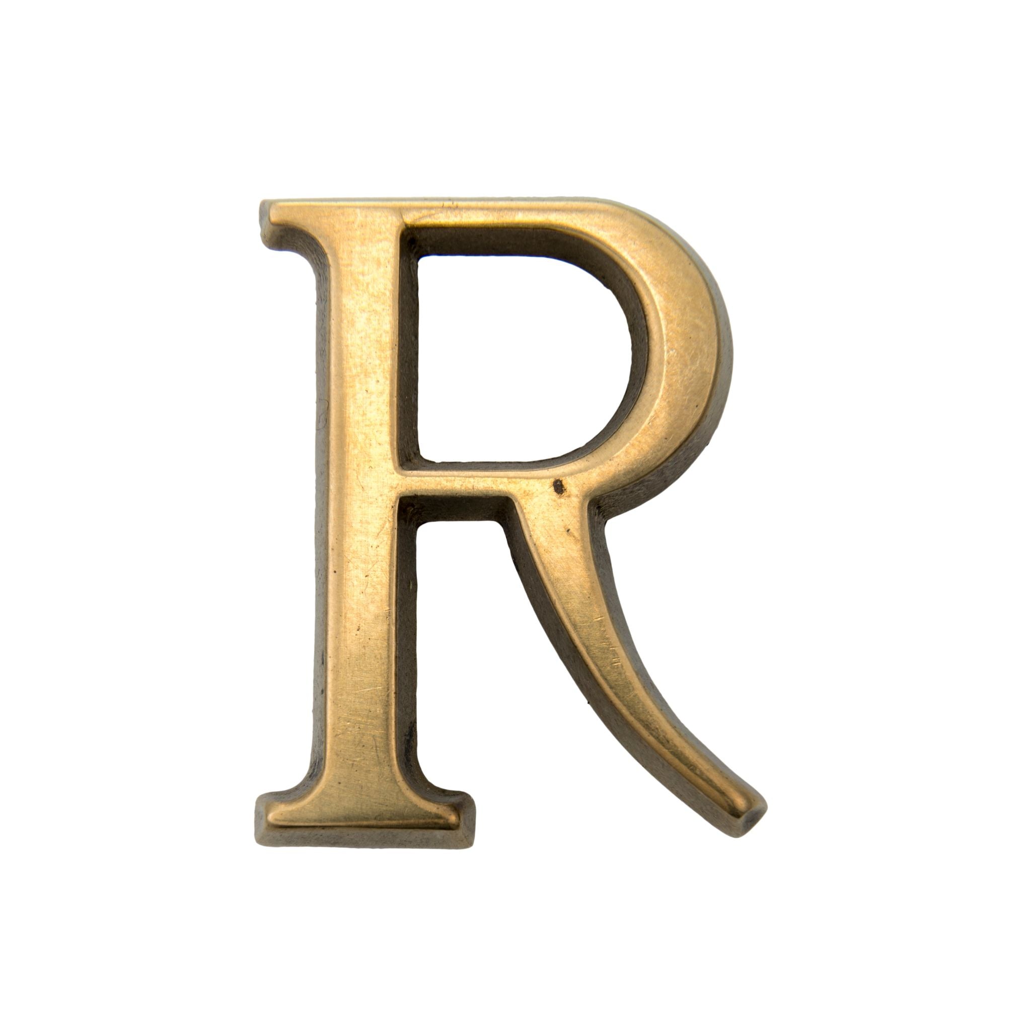 This is a medium-sized letter R, crafted from solid brass. It has a smooth, polished surface with an elegant and timeless finish. The design is versatile, making it suitable for both modern and classic exteriors. Its durable construction ensures long-lasting quality and a refined appearance.