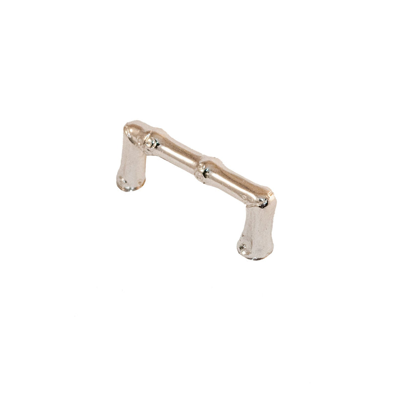 A polished brass cabinet knob with a detailed bamboo pattern design, inspired by Kyoto