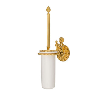 This toilet brush holder features a smooth and sturdy ceramic container, designed to hold the brush securely. The base and accents are crafted from polished brass, adding a sleek, cool-to-the-touch metallic texture. At the top of the holder, an intricately detailed cherub motif is sculpted into the brass, offering a raised and textured design that adds a classical and artistic feel. 