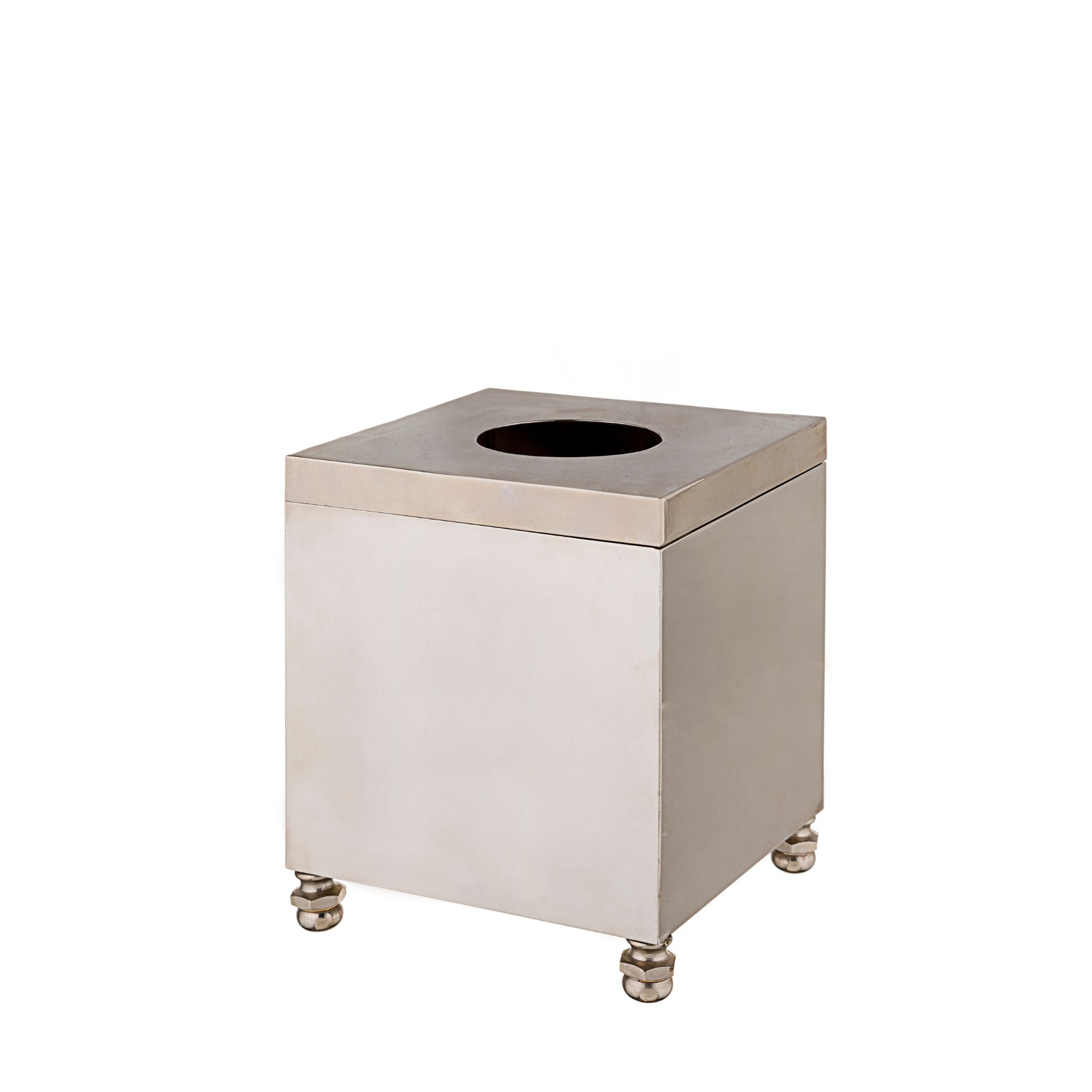 A square-shaped tissue box cover made of solid brass with a smooth, polished surface. Its minimalist design adds a touch of elegance and luxury to any setting. The brass has a warm metallic sheen, and the box is sturdy, with a top opening for easy access to tissues.