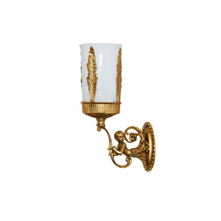 This toothbrush holder features a smooth, cylindrical ceramic body paired with a solid brass base. The brass base is adorned with a detailed faun motif, providing a raised, textured element that adds a sense of artistry. The ceramic is sleek and cool to the touch, offering a seamless surface for holding toothbrushes securely. The combination of the polished brass and the smooth ceramic creates a blend of tactile contrasts.