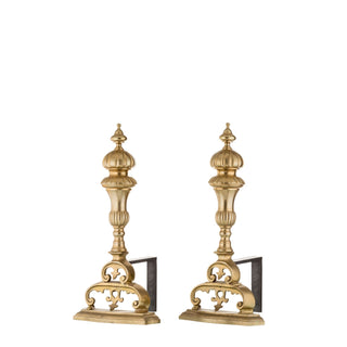 "Our brass and iron andirons are designed to combine strength and elegance for your fireplace. Each andiron features a solid iron base with a slightly textured surface for stability and durability. The upper section is adorned with smooth, polished brass accents, offering a sleek and cool-to-the-touch feel. The minimalist yet refined design makes these andirons both functional, securely holding firewood in place, and decorative, enhancing the aesthetic of your fireplace.