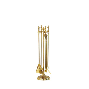 This is a fireplace tool set crafted from solid brass, featuring a polished and smooth finish. The set includes four essential tools: a poker, a shovel, a brush, and tongs. Each tool is designed with ergonomic handles for a comfortable grip and easy use. The brass material provides a classic, luxurious feel, making it both a functional and decorative addition to your fireplace setup.