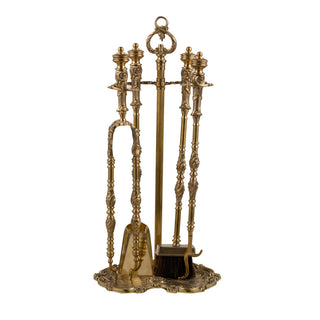 Our brass fireplace tool set is a handcrafted collection designed to bring both beauty and utility to your home. The set includes essential tools such as a poker, brush, tongs, and shovel, all made from sturdy, polished brass with a timeless design. The tools have a smooth, slightly cool touch with rounded edges for safety. The set stands upright in a matching brass holder with a firm base for stability. It’s not just functional but also a sophisticated addition to any fireplace.