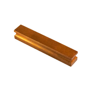 Sleek bar-style brass knob with a smooth, polished finish, suitable for cabinets, drawers, and doors.