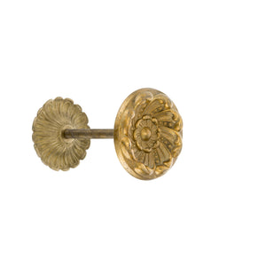 A circular curtain tieback made of solid brass with a smooth, polished finish. The tieback features a simple yet elegant ring design, perfect for holding curtains in place while adding a touch of luxury and refinement to your space.