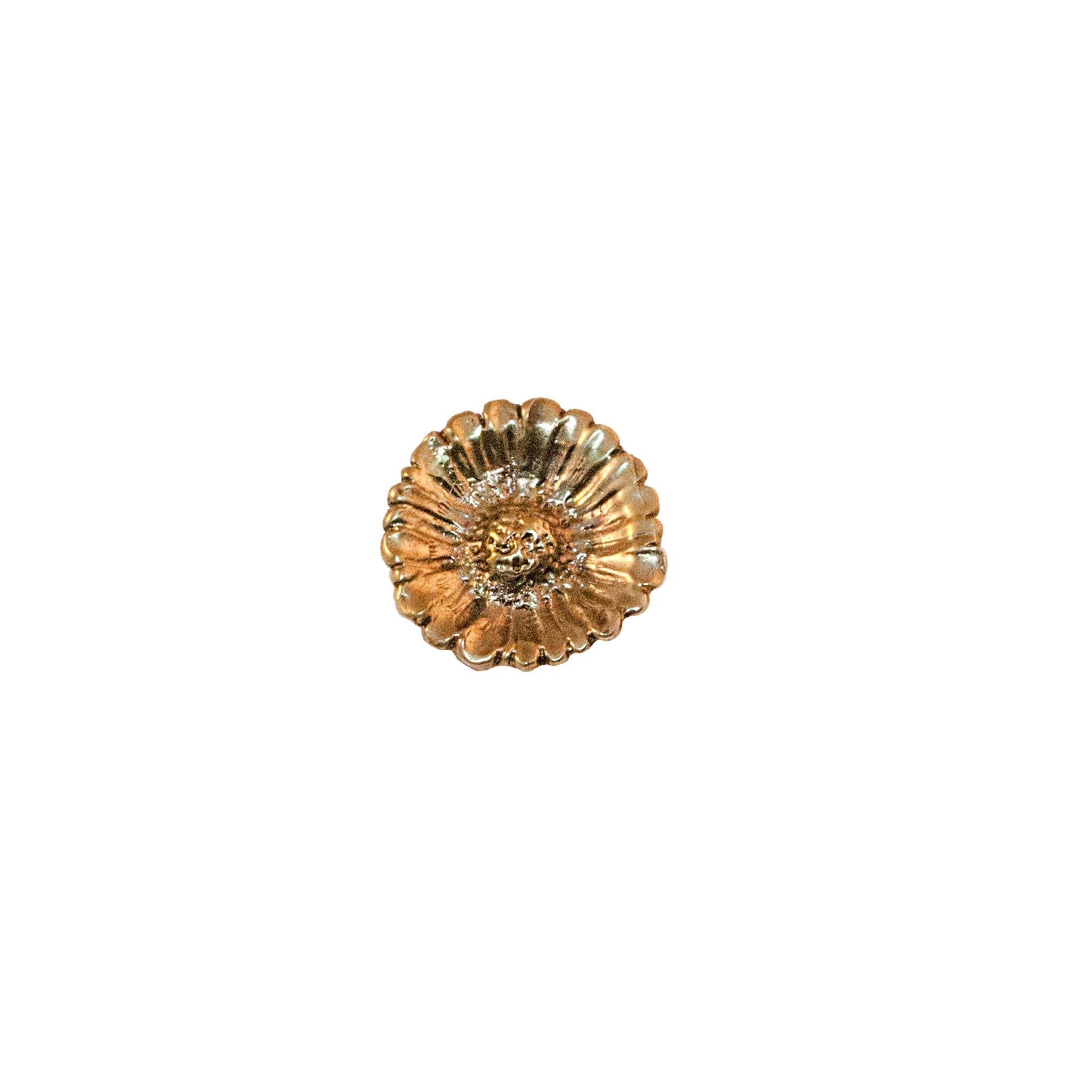 A small brass knob featuring a decorative daisy design, adding floral charm to your decor.