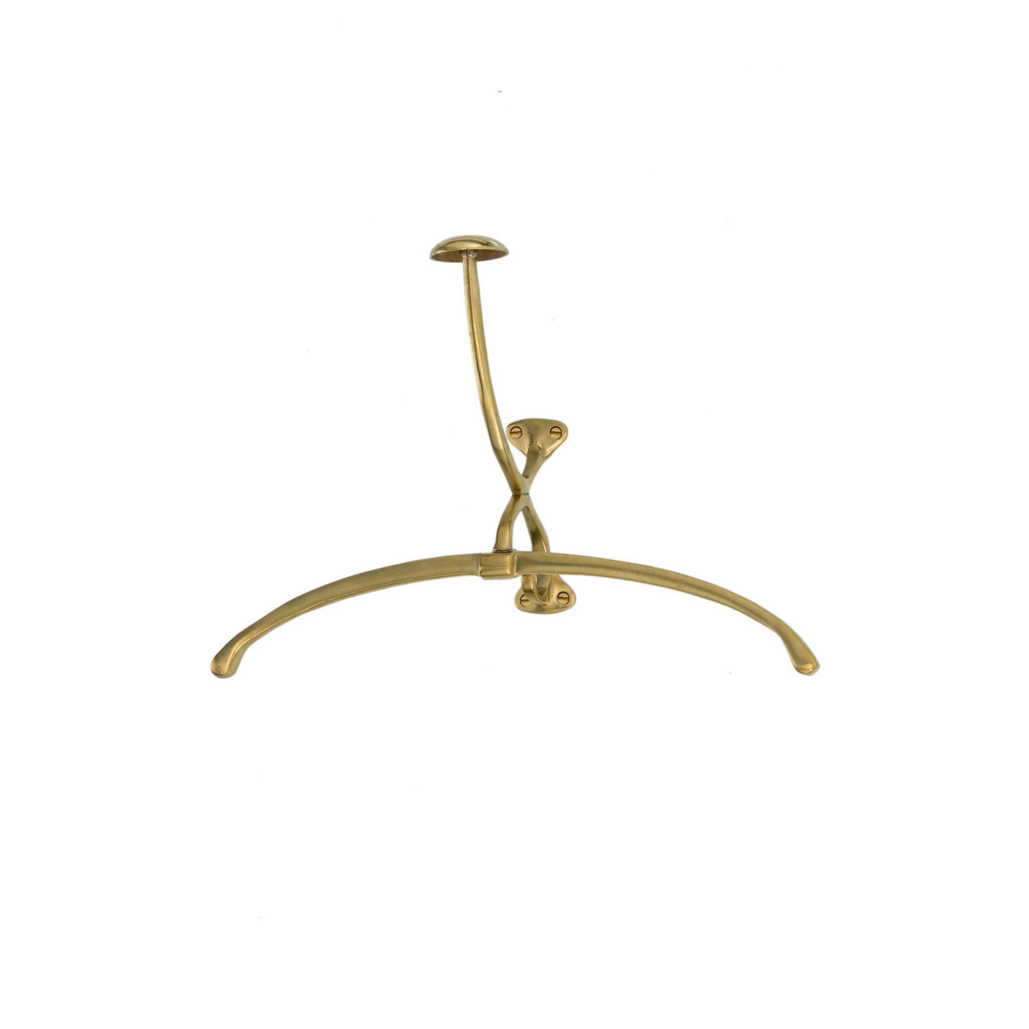 A solid brass coat hook with a smooth, curved design. The hook has a rounded shape, sturdy and durable, ideal for holding coats, hats, or bags. Its polished surface gives it a warm golden color, adding a touch of elegance to any space. The base of the hook is simple and smooth, allowing it to fit seamlessly into both modern and traditional interiors.