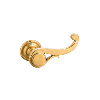 This door handle is medium-sized and crafted from solid brass, designed in an elegant scroll shape. It has a smooth, curved surface that is comfortable to hold and easy to grip, suitable for both right and left hands. The handle has a polished finish, giving it a slightly warm, metallic feel. It adds a sense of classic elegance to doors, ideal for enhancing both modern and traditional interiors.