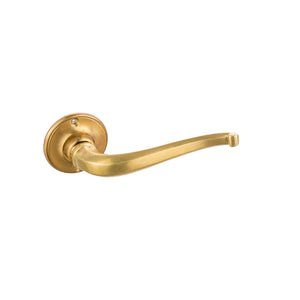 This door handle is made from solid brass and features soft, gentle curves. The smooth, rounded design provides a comfortable grip and a pleasing feel to the touch. The handle has a polished, warm metallic finish, adding a sense of elegance and refinement. It’s an ideal accent for doors in both traditional and modern spaces, bringing a graceful, flowing shape to any setting.