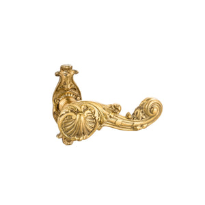 This door handle is crafted from solid brass and shaped like a seashell, with gentle curves and subtle ridges that mimic the texture of a natural shell. Its smooth, polished surface has a warm metallic feel, offering a comfortable grip. The shell design adds a touch of elegance and a hint of coastal charm, making it suitable for both classic and modern interiors.