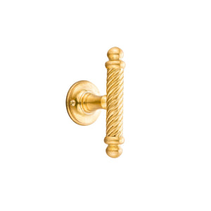 This window handle has a distinctive spiral design crafted from solid brass. The handle’s spiral shape offers a gentle, twisting texture that is smooth to the touch and provides a comfortable grip. The polished brass finish feels warm and solid, giving an elegant and timeless quality. This handle is both functional and decorative, bringing an artistic, refined detail to any window.