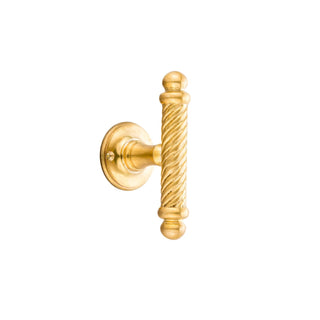 This window handle has a distinctive spiral design crafted from solid brass. The handle’s spiral shape offers a gentle, twisting texture that is smooth to the touch and provides a comfortable grip. The polished brass finish feels warm and solid, giving an elegant and timeless quality. This handle is both functional and decorative, bringing an artistic, refined detail to any window.