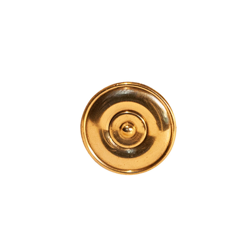A polished circular brass knob with intricate decorative patterns, suitable for cabinets, drawers, and doors.