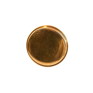 A polished circular brass knob with a sleek, minimalist design, suitable for cabinets, drawers, and doors.