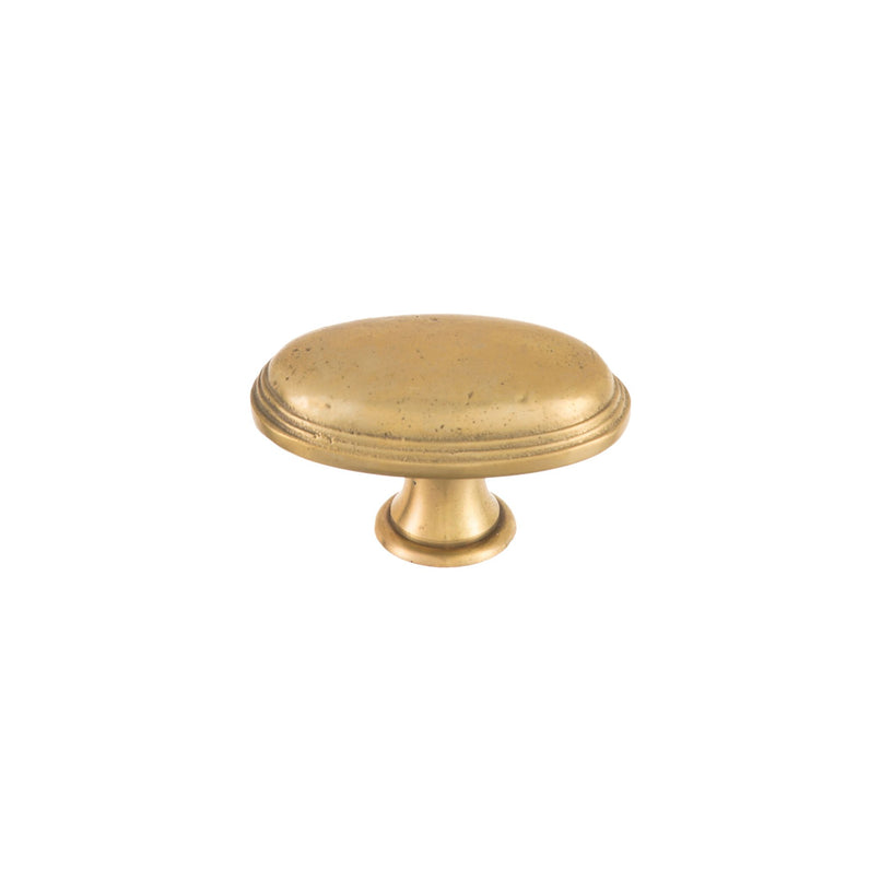 Oval brass knob with a smooth, polished finish, suitable for cabinets, drawers, and doors.
