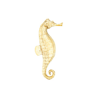 A detailed brass knob shaped like a seahorse, perfect for enhancing your decor with coastal charm.