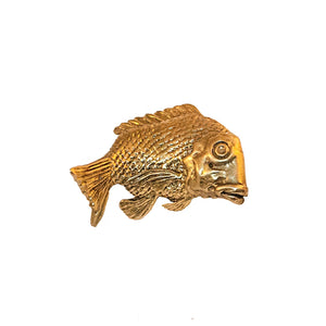 Brass Portofino fish-shaped knob with intricate details and a polished finish, perfect for adding a touch of coastal elegance to cabinets and drawers.