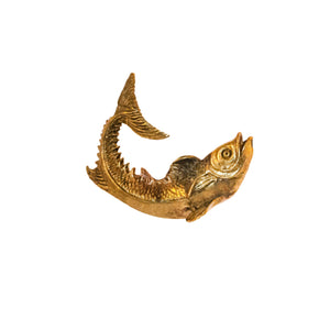 Brass Sorrento fish-shaped knob with intricate details and a polished finish, perfect for adding an elegant nautical touch to cabinets and drawers.