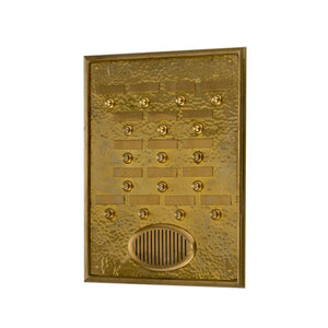 A rectangular brass board adorned with 17 small bells. Each bell has a smooth, polished brass surface and is arranged in rows across the board, creating a neat, orderly pattern. The brass board itself may feature subtle decorative details, such as engraved patterns or raised edges. When gently rung, the bells produce a clear, pleasant, tinkling sound. Overall, this piece combines both functional and ornamental qualities, adding a charming, timeless element to any space.