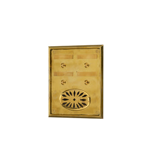 A small, rectangular brass board holding four evenly spaced bells. Each bell is polished and smooth, producing a clear, pleasant chime when tapped. The brass surface has a warm, golden tone and a solid, sturdy feel. Arranged in a simple, balanced pattern, the bells create a harmonious sound that adds a touch of classic elegance and gentle melody to any room.