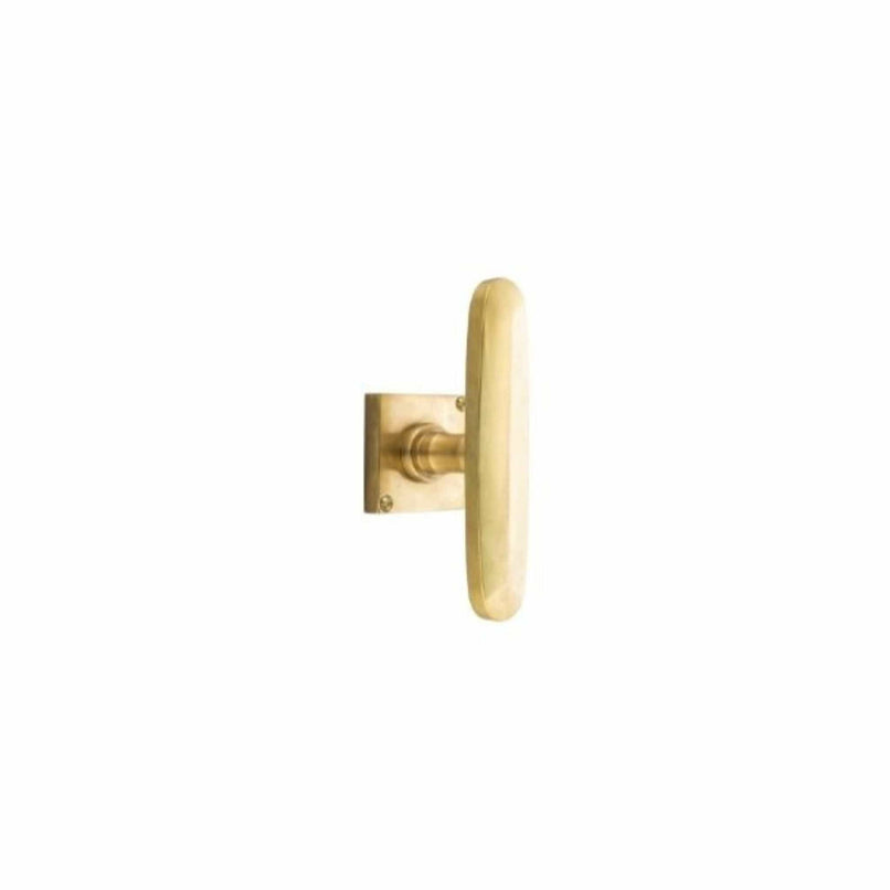 Novecento brass cuneiform window handle - ilbronzetto