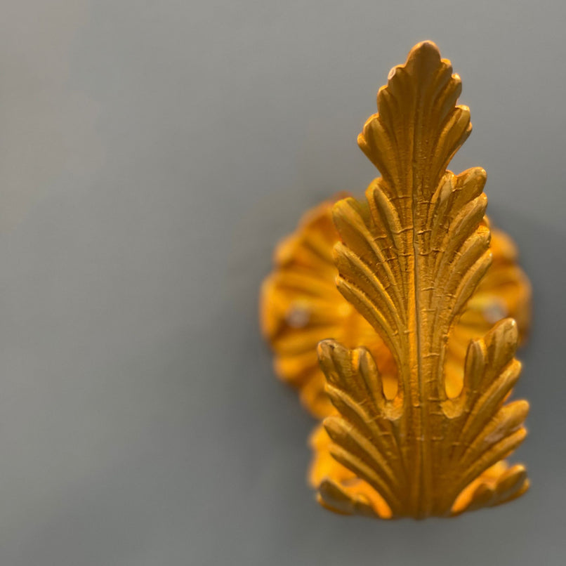Orsay  brass leaf curtain holder