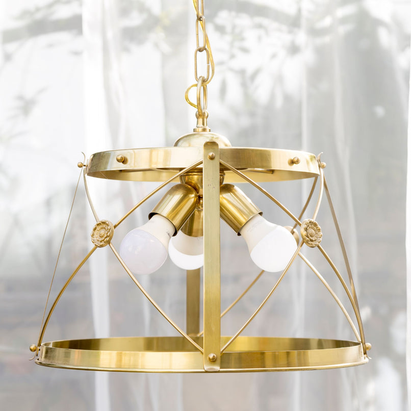 Novecento cross brass chandelier