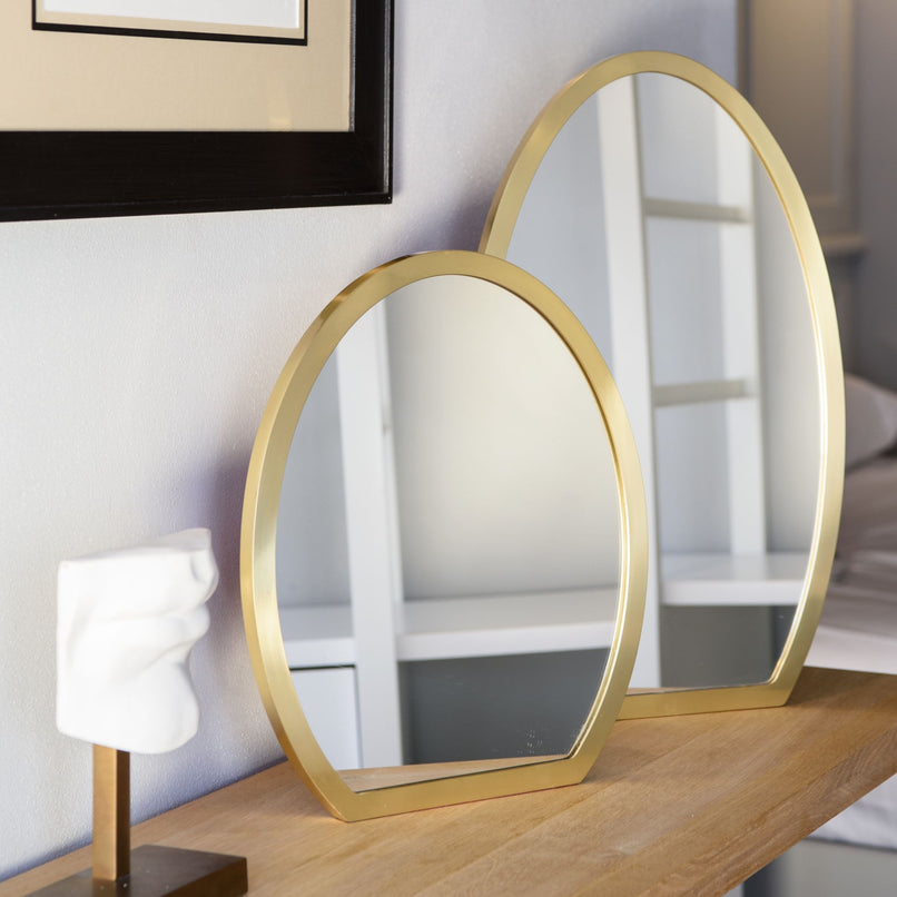 Small brass oval mirror