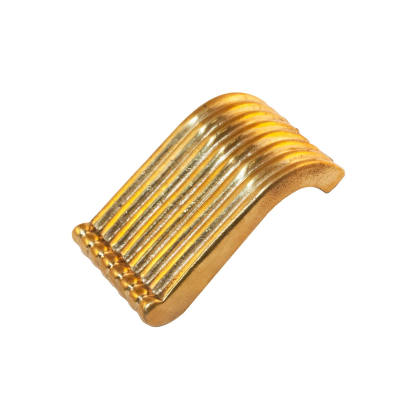 An image of a large ribbed brass knob against a neutral background. The knob features fine grooves along its surface, adding texture and style to furniture or drawers.